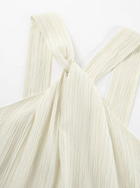 Halter neck maxi dress by Trendsi featuring a flowing silhouette, sleeveless design, and elegant style for summer occasions.