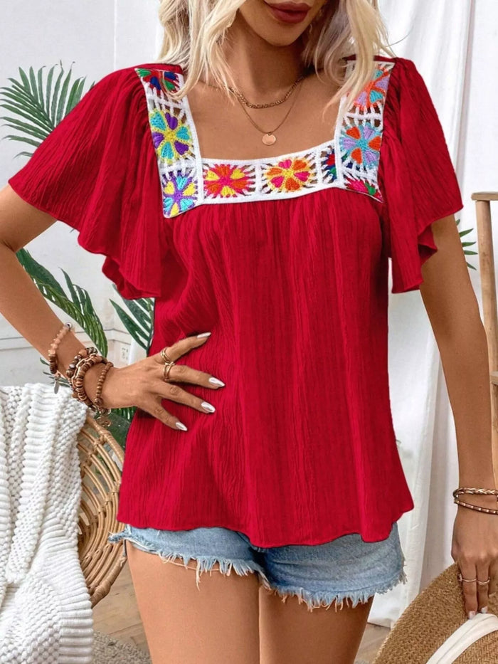 Embroidered square neck flutter sleeve blouse from Trendsi featuring intricate embroidery and lightweight fabric.