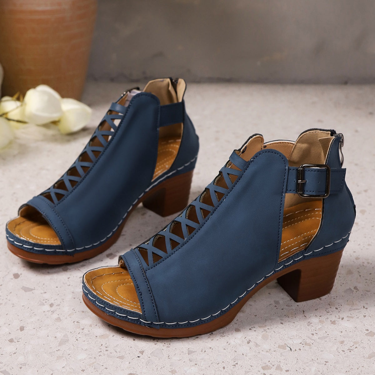 Open toe block heel sandals by Trendsi featuring stylish straps and a chunky heel, perfect for casual or dressy occasions.