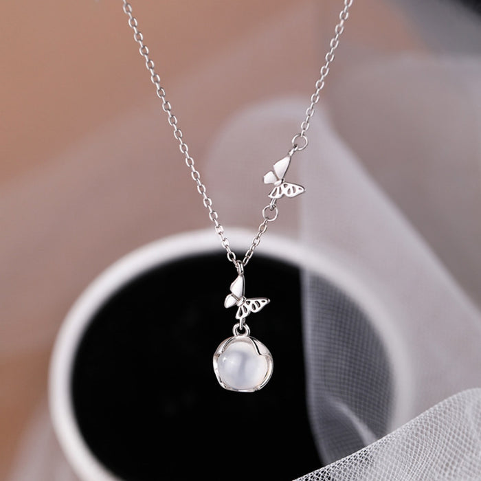Sterling silver pendant necklace with intricate design, featuring a 925 sterling silver chain and detailed pendant.