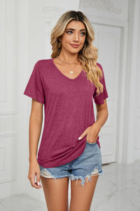 Light gray essential V-neck tee from Trendsi, soft fabric, fitted style, displayed on a hanger with a plain background.