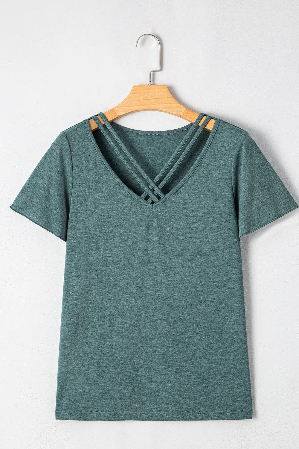 Cream-colored classic V-neck tee from Trendsi, featuring a soft fabric and a relaxed fit, perfect for casual wear.