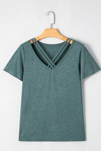 Cream-colored classic V-neck tee from Trendsi, featuring a soft fabric and a relaxed fit, perfect for casual wear.
