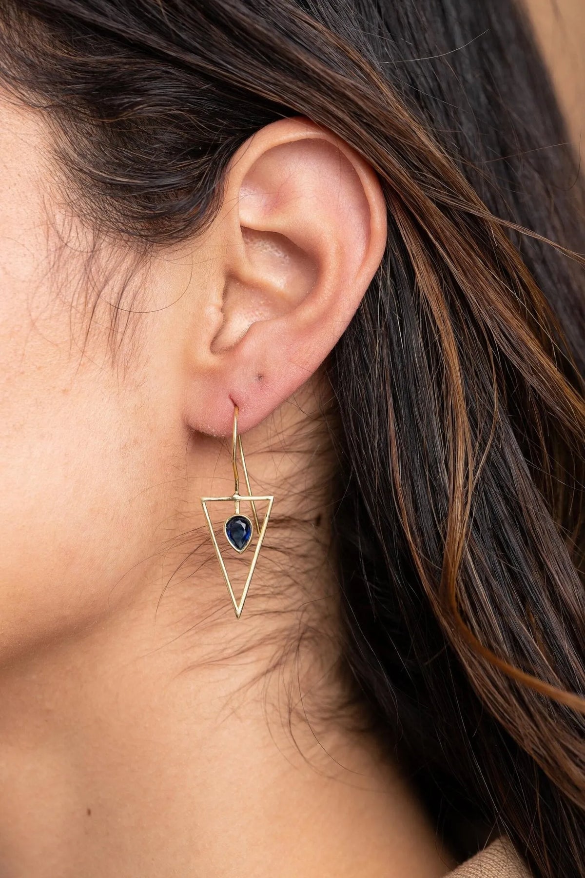 Silver triangle open frame gemstone earrings by SAACHI featuring geometric design and colorful gemstones.