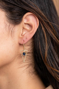 Silver triangle open frame gemstone earrings by SAACHI featuring geometric design and colorful gemstones.