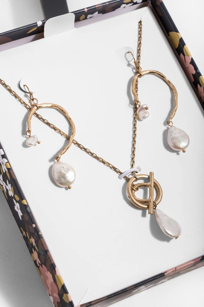 SAACHI pearl earrings in a gift box, showcasing elegant jewelry with matching pearl necklace and earrings for special occasions.