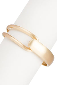SAACHI overlap hinged bracelet with sleek metal design, featuring interconnected overlapping links and a secure hinge closure.