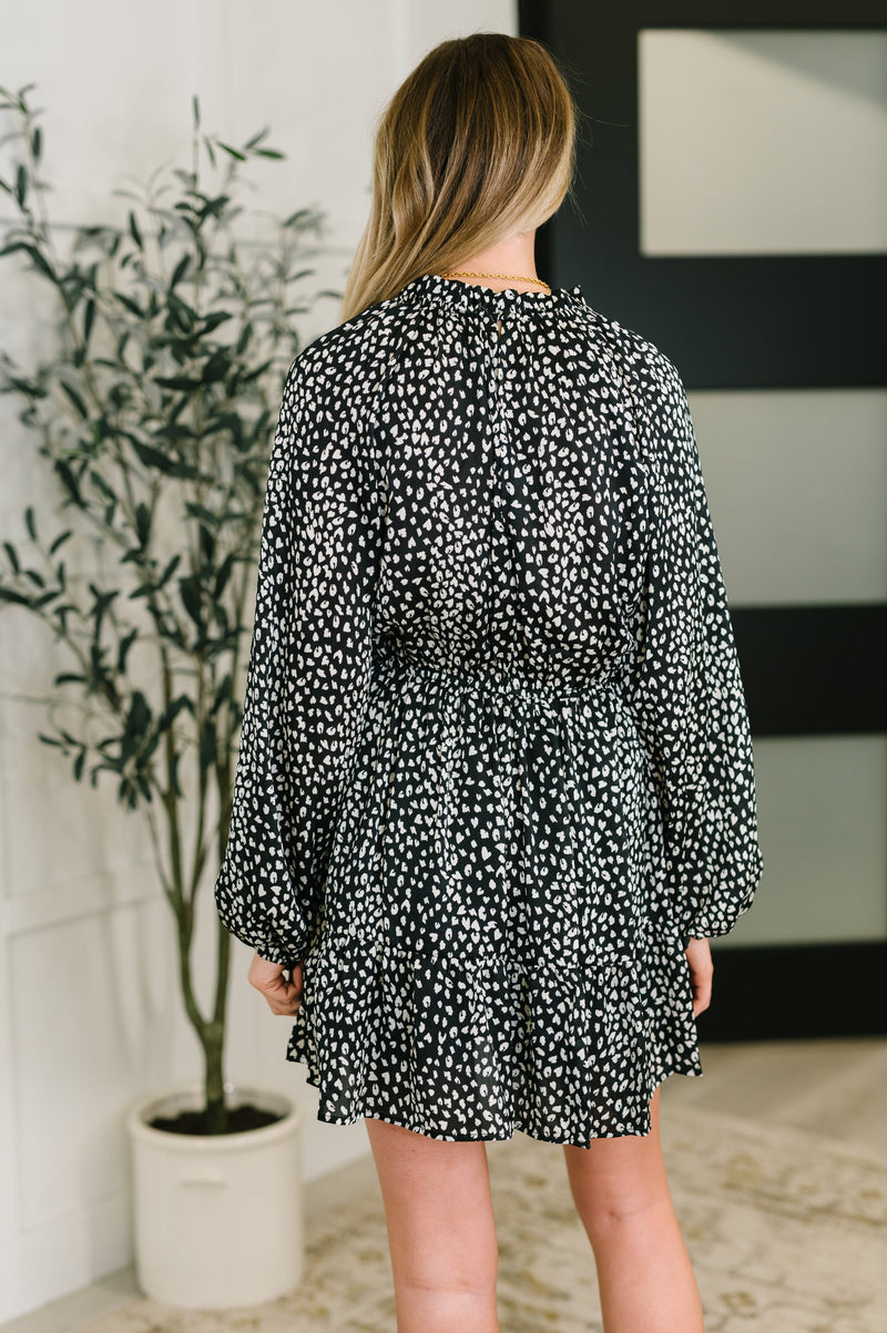 cheeky little tiered dress detail of raglan sleeves with elastic cuffs