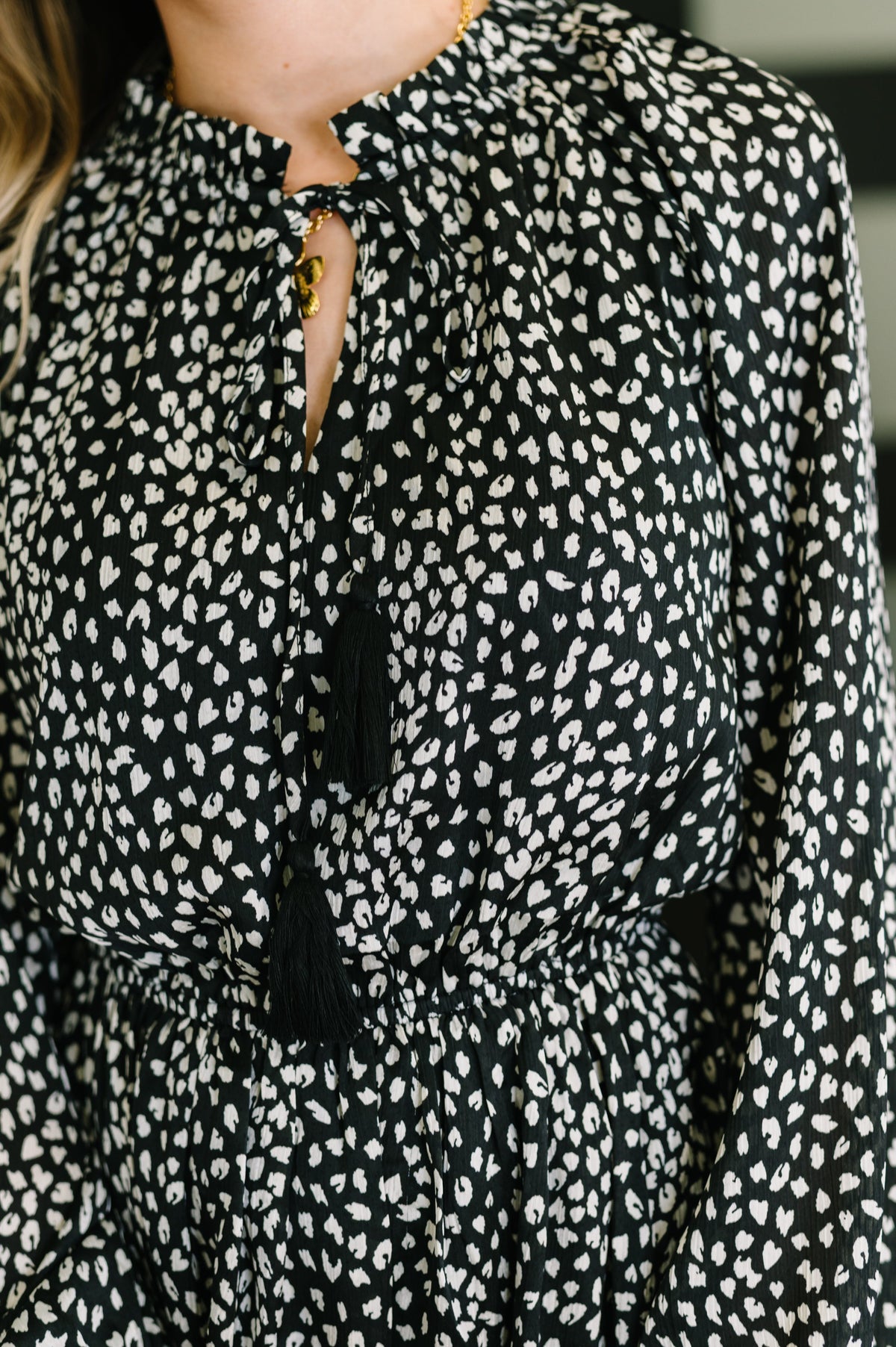 A cheeky little tiered dress back view showing gathered hem detail