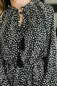 A cheeky little tiered dress back view showing gathered hem detail