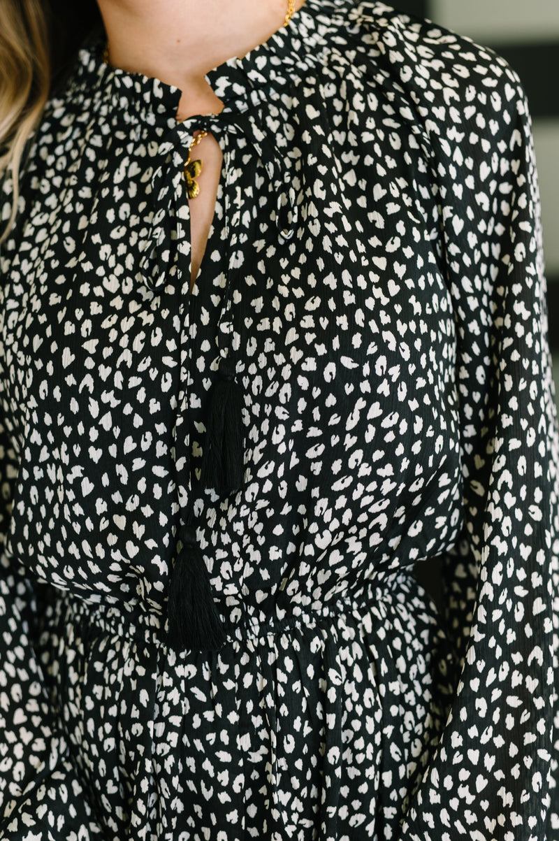 A cheeky little tiered dress back view showing gathered hem detail