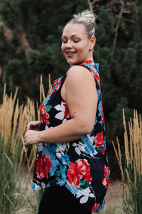 A sleeveless blouse by Ave Shops featuring a floral rose pattern, stylish and casual for warm weather wear.