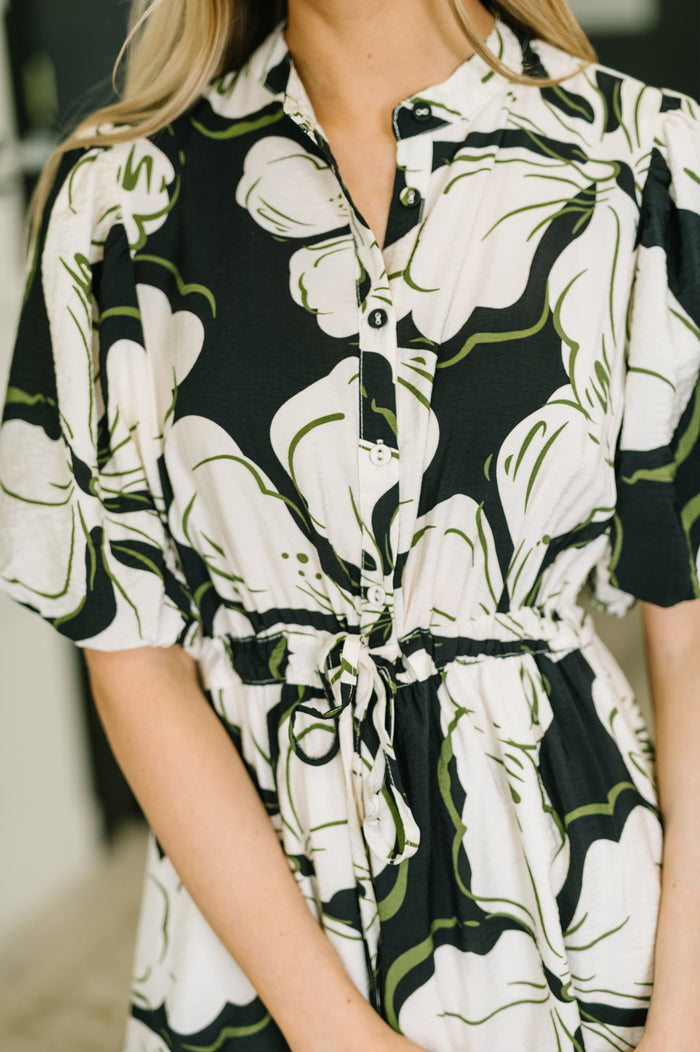 Light blue puff sleeve midi dress from Ave Shops, featuring a fitted waist and flowing skirt, perfect for art show or casual wear.