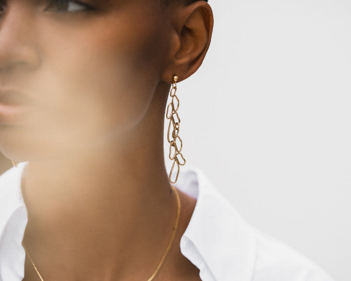 Tillydoro long moss earrings with delicate green moss and gold-tone accents, hanging elegant jewelry for women.