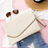 Aili's Corner foldover envelope clutch handbag in beige with a sleek, minimalist design and fold-over flap.
