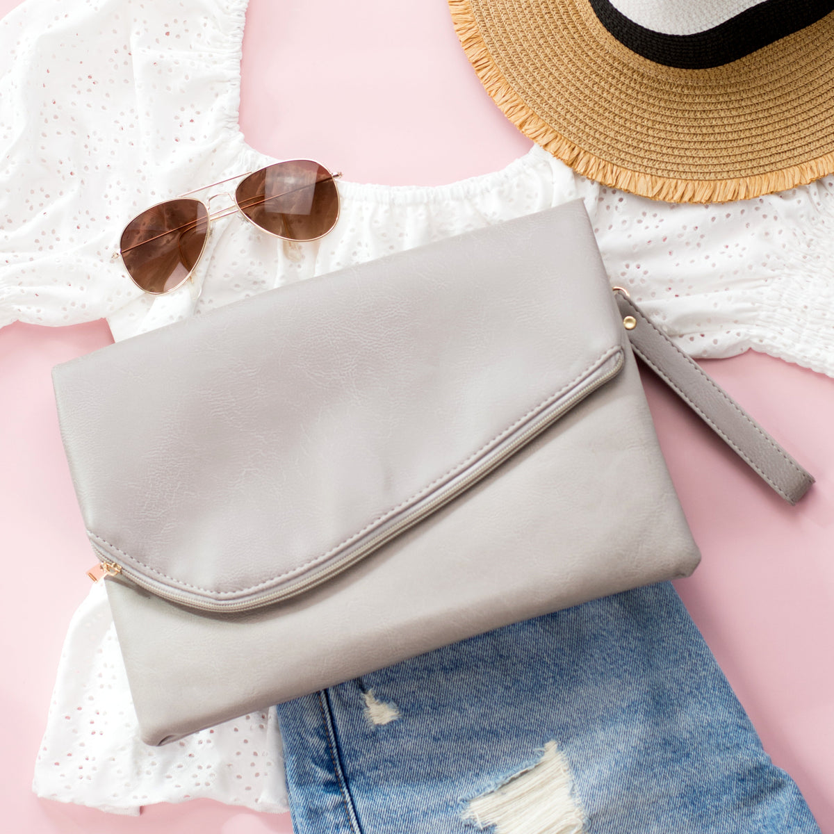 Gray foldover envelope clutch handbag by Aili's Corner with sleek design and foldover flap.