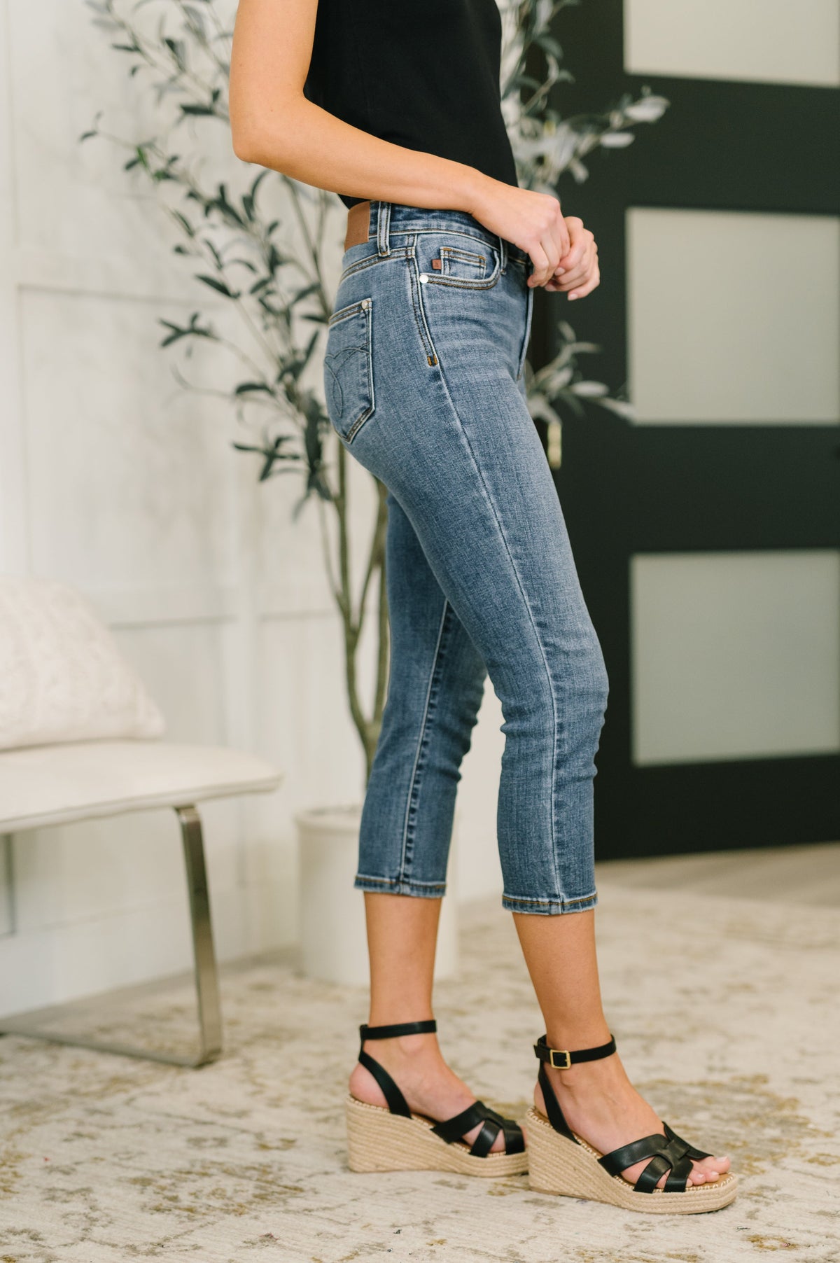 Light blue Deborah mid-rise Capri jeans from Ave Shops, featuring a classic fit and five-pocket design.