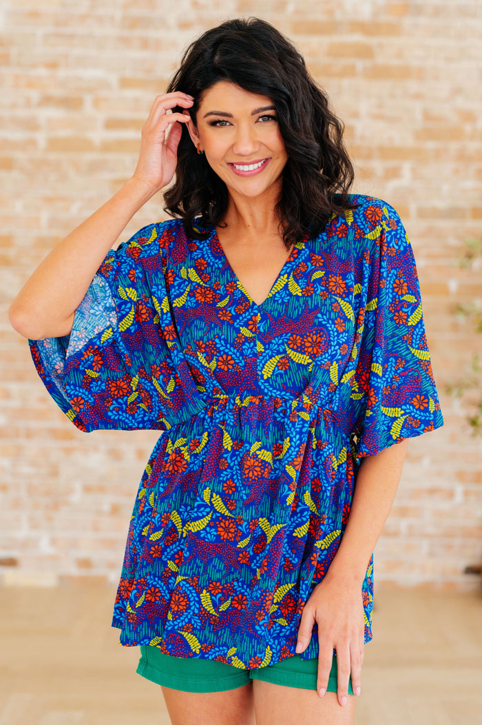 Dreamer peplum top in royal and red abstract print, stylish women's tops by Ave Shops, with a fitted waist and flared hem.