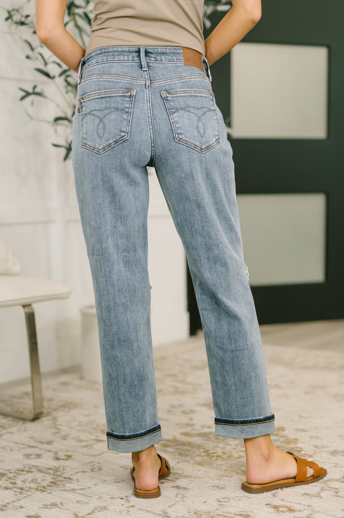 Light blue Ave Shops Elaine mid-rise boyfriend jeans with distressed details and rolled cuffs, casual and stylish denim pants.