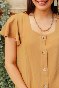 Taupe Envy Me blouse by Ave Shops, featuring a stylish, fitted top with long sleeves and a round neckline.
