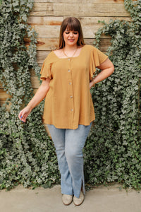 Taupe Envy Me blouse from Ave Shops, stylish and comfortable shirt with a relaxed fit, shown on a hanger.