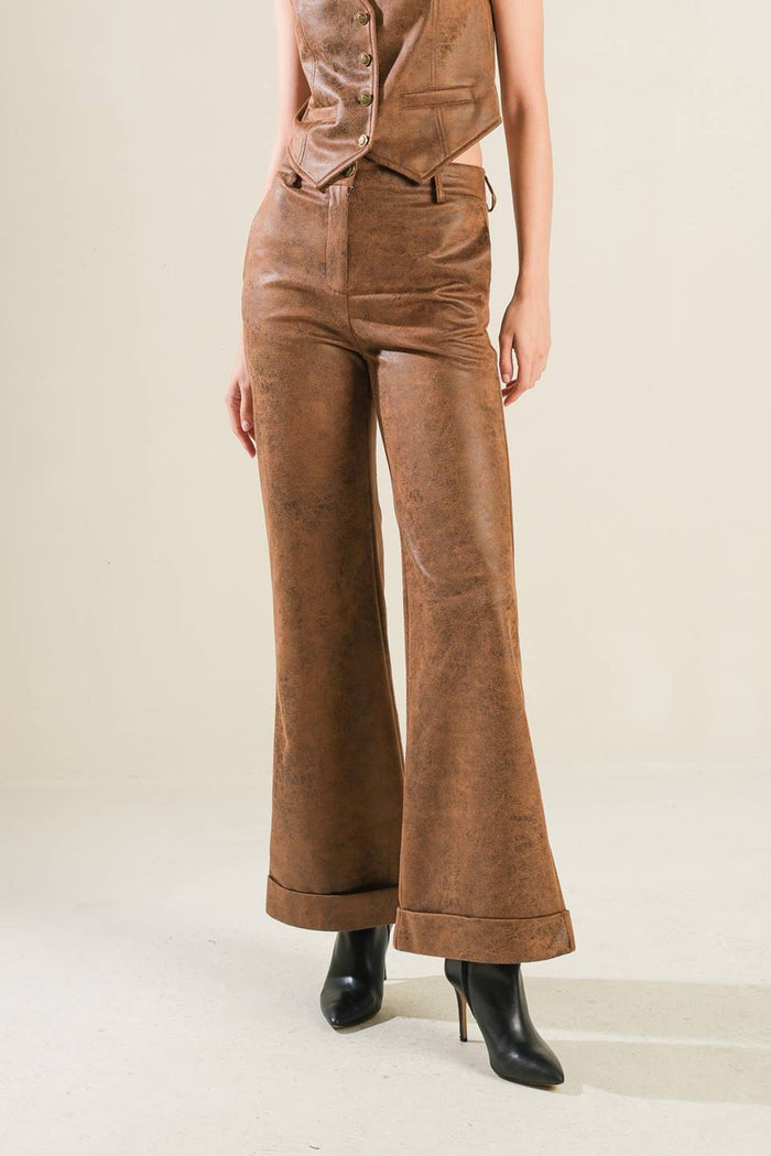 A Gift From Love leather pants in brown faux leather with pockets and front closure
