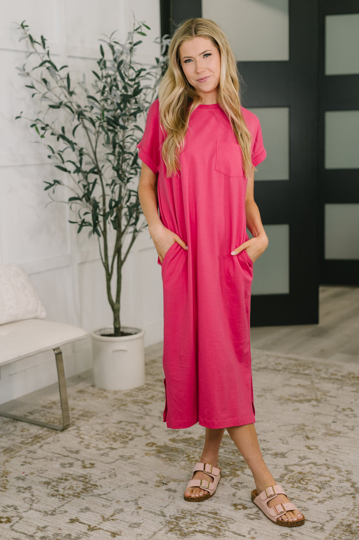 Hot pink short sleeve midi dress by Ave Shops, featuring a fitted waist and stylish design, perfect for casual or semi-formal wear.