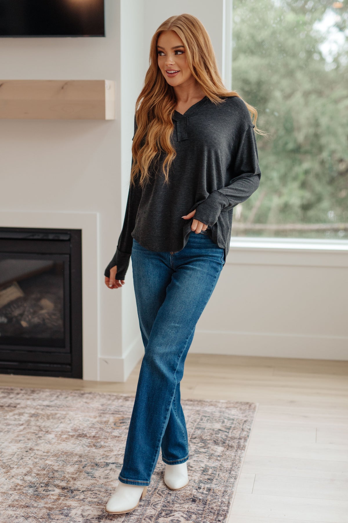 Top de manga larga con amuleto de la buena suerte