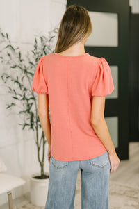 Coral balloon sleeve blouse by Grace & Virtue featuring puffed sleeves and a relaxed fit, ideal for stylish casual wear.