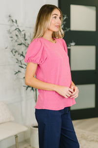 Fuchsia balloon sleeve blouse by Grace & Virtue, featuring puffed sleeves and a relaxed fit, styled on a model.
