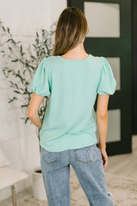 Mint green balloon sleeve blouse by Grace & Virtue featuring a relaxed fit and elegant design.