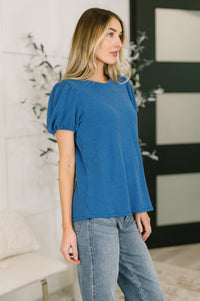 Ocean blue balloon sleeve blouse from Grace & Virtue, featuring a stylish, flowy design with puffed sleeves and a relaxed fit.