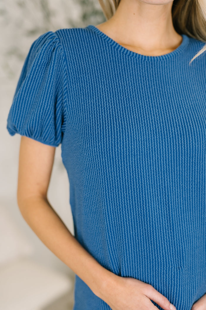 Ocean blue balloon sleeve blouse by Grace & Virtue, featuring flowing fabric and stylish design, perfect for casual or dressy occasions.