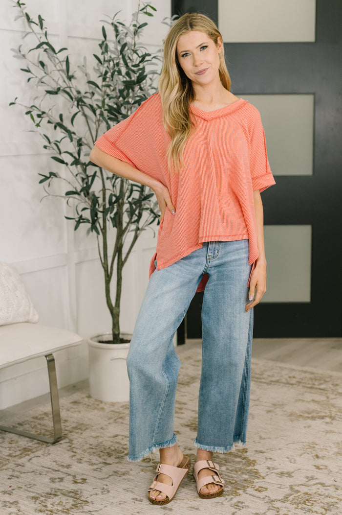 Coral V-neck tee from the Growing Restless collection by Ave Shops, featuring a relaxed fit and soft fabric.
