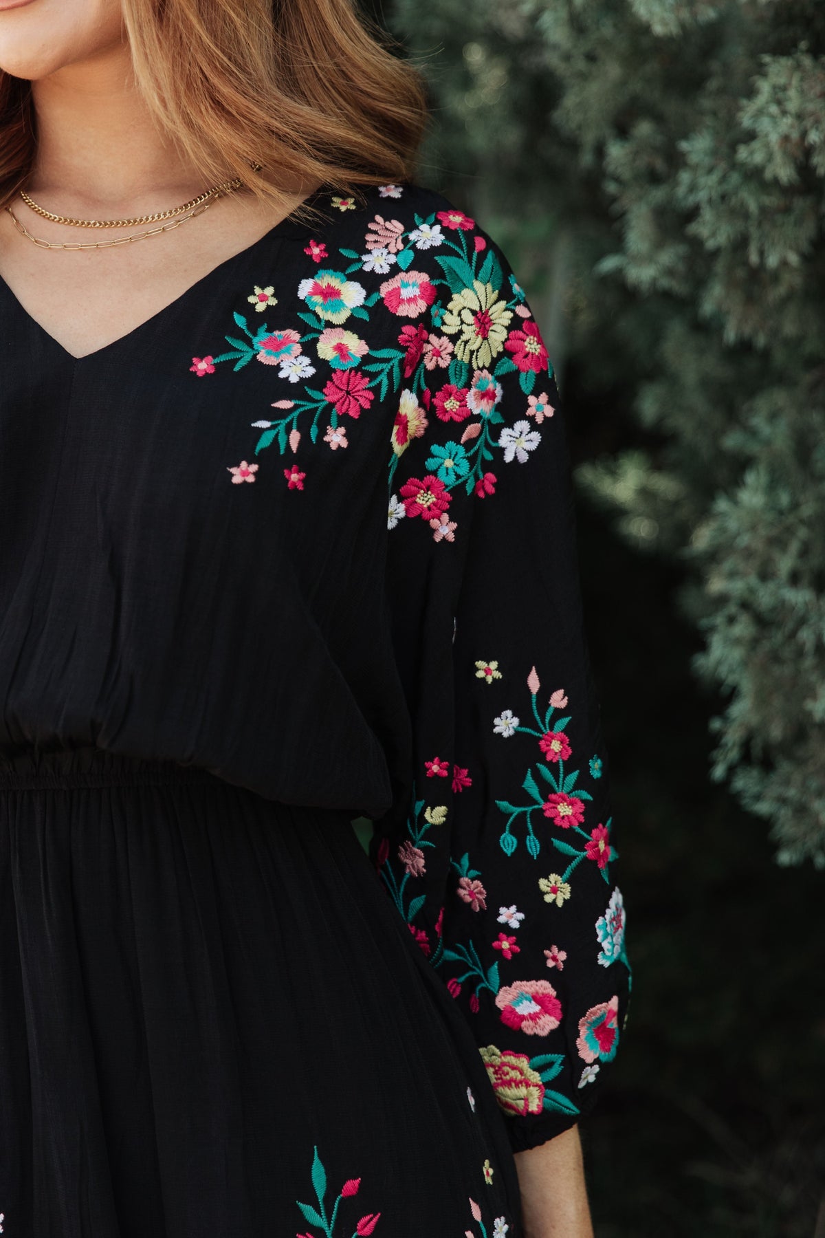Floral embroidered dress from Ave Shops featuring vibrant flower patterns and a stylish, elegant design.