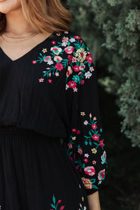 Floral embroidered dress from Ave Shops featuring vibrant flower patterns and a stylish, elegant design.
