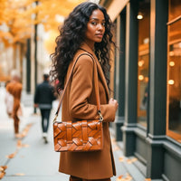 THE ZENOBIA WOVEN CLUTCH