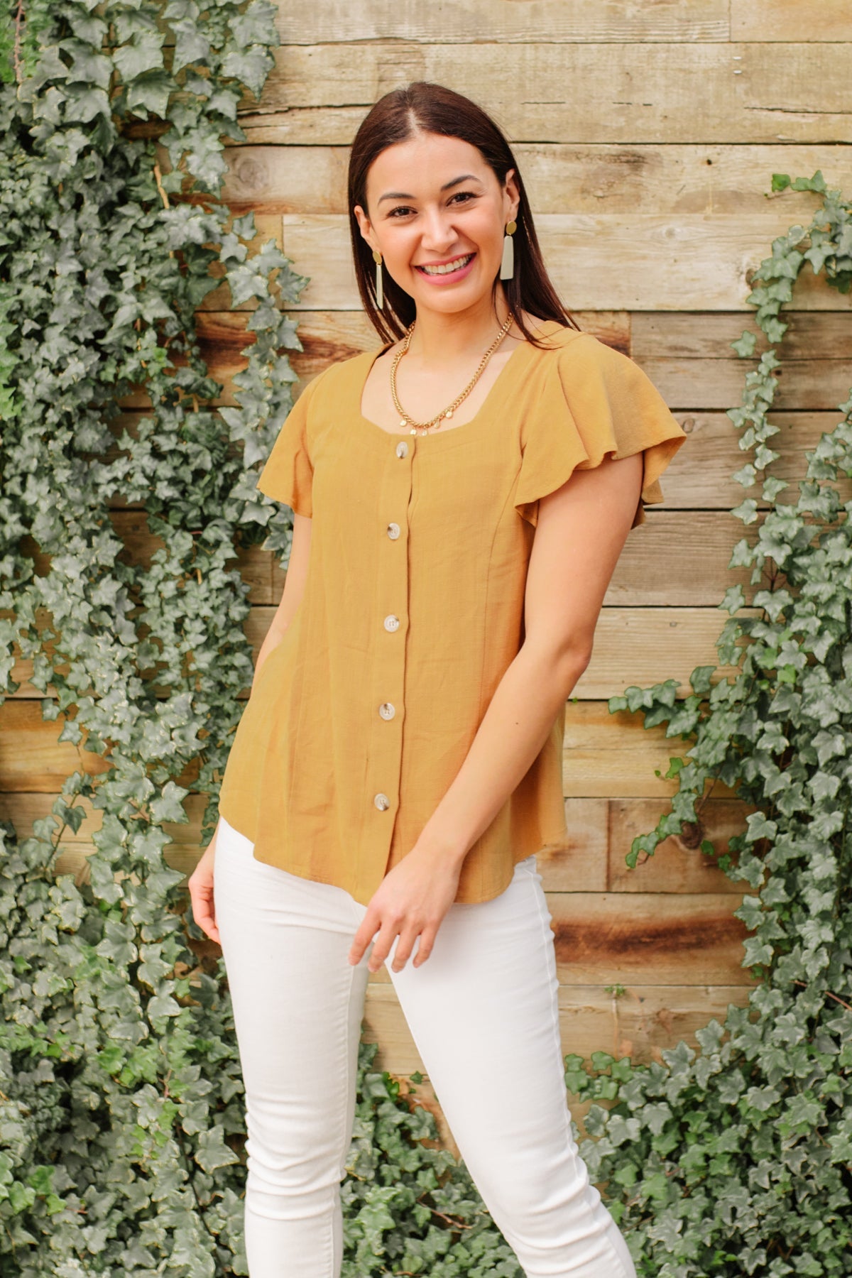 Taupe Envy Me blouse by Ave Shops, stylish women's top with a relaxed fit, showcased on a hanger.