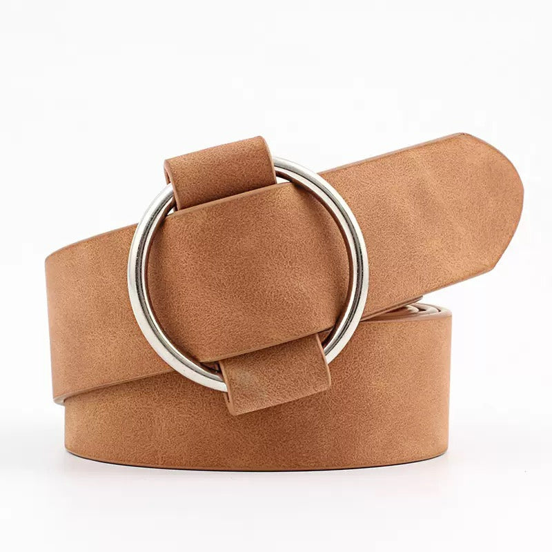 Aili's Corner Everyday O Ring Belt, stylish black belt with circular O ring buckle, made of smooth leather for casual wear.