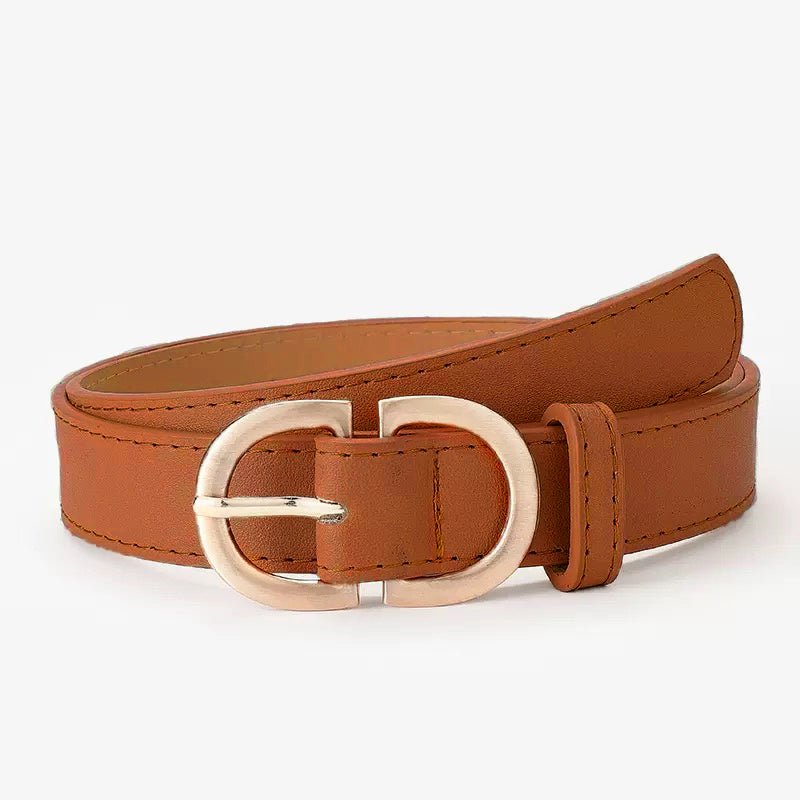 Aili's Corner everyday D ring belt in cognac leather, featuring a sleek metal D ring buckle and smooth finish.