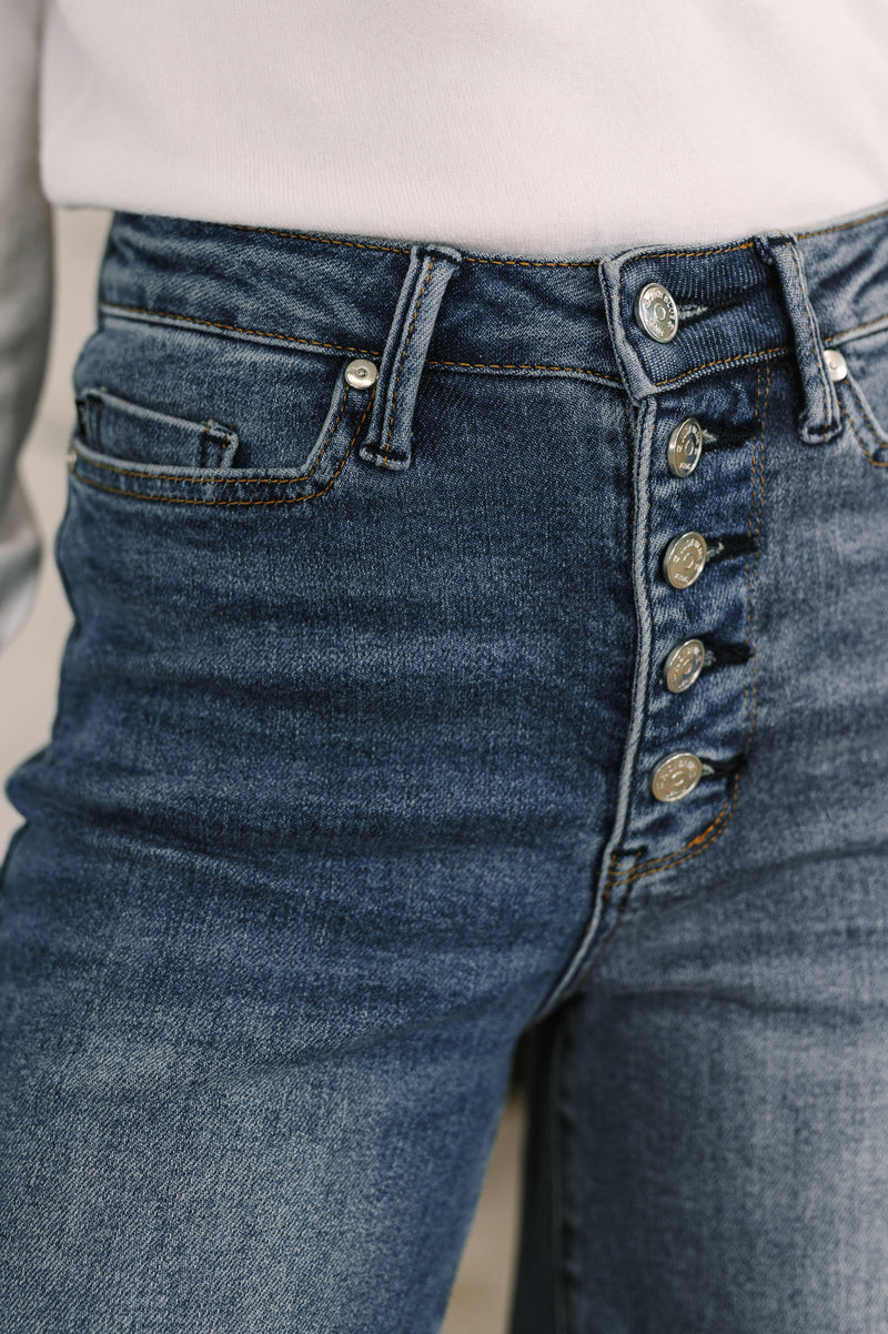 Paquetes de Karla de cintura alta, columna recta, botones, bragueta y ribete en la espalda