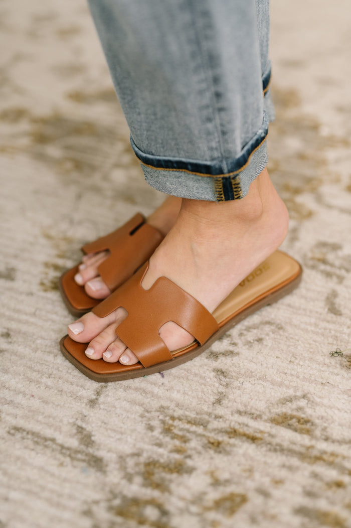 Cognac knit square toe slide-on sandal by Ave Shops, featuring a comfortable slip-on design and stylish woven knit upper.
