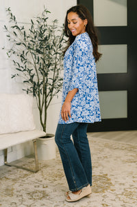 Blue and white floral Lizzy cardigan by Ave Shops, featuring a cozy knit with floral pattern and button closure.