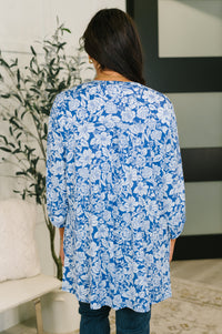 Blue and white floral Lizzy cardigan by Ave Shops, featuring a cozy knit with a floral pattern and button details.