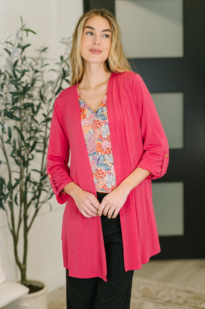 Womens Lizzy Cardigan in vibrant fuchsia, featuring a cozy knit design and open front for a stylish layer.