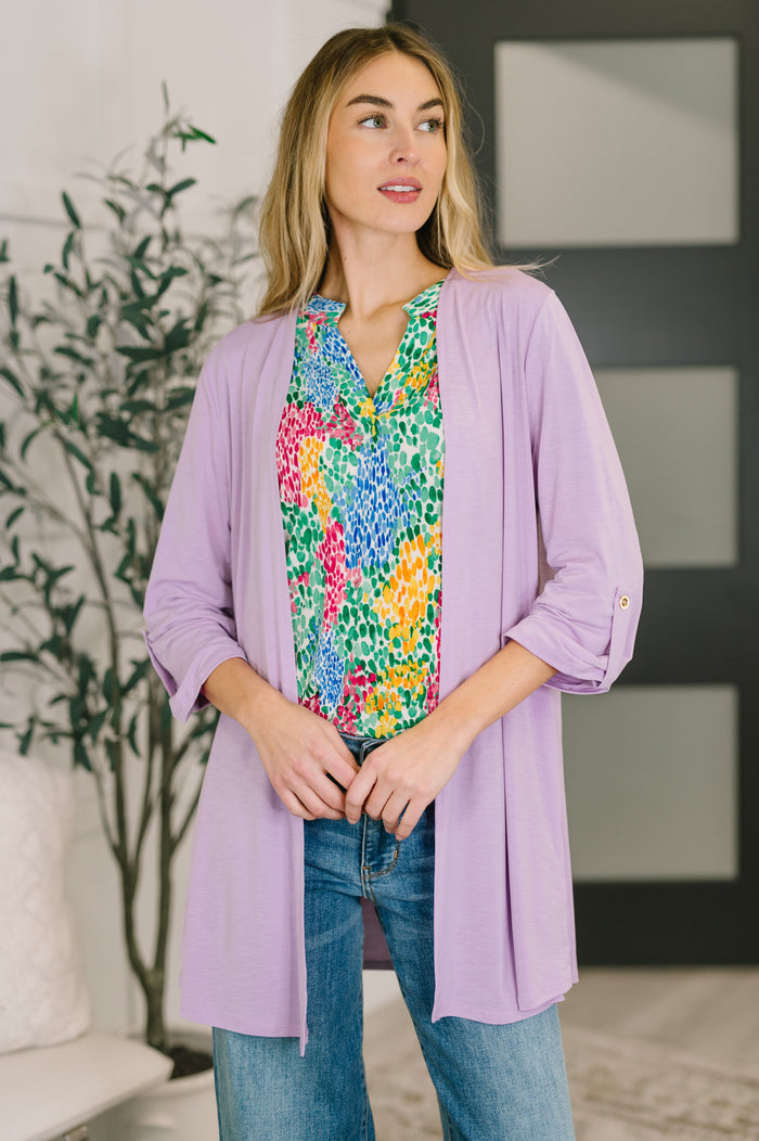 Ave Shops Lizzy Orchid Bloom cardigan, soft knit fabric, long sleeves, button-front design, vibrant floral pattern.
