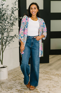 Lizzy cardigan by Ave Shops in teal and pink floral abstract pattern, featuring a cozy knit design and open front style.