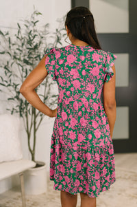 Green and pink floral Lizzy Forever flutter sleeve dress by Ave Shops, featuring a lightweight, feminine design and vibrant pattern.