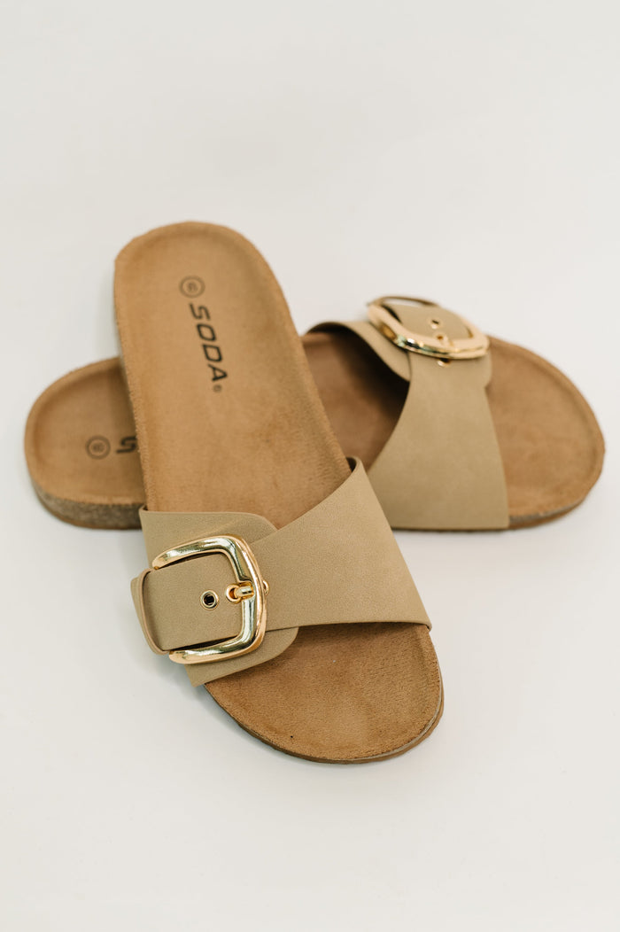 Taupe Lizzy slip-on buckle strap sandal by Ave Shops, featuring a comfortable flat sole and stylish design.