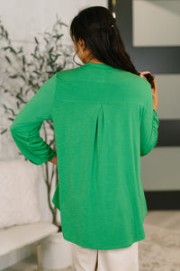 Kelly green Lizzy top by Ave Shops, stylish blouse with a relaxed fit, featuring a V-neck and long sleeves.